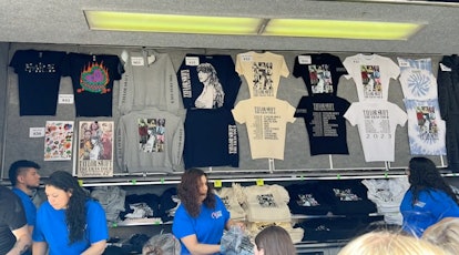 The Taylor Swift 'Eras Tour' merch truck has all the show exclusive merch like the blue crewneck and...