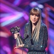 Taylor Swift speaks onstage at the 2023 iHeartRadio Music Awards 