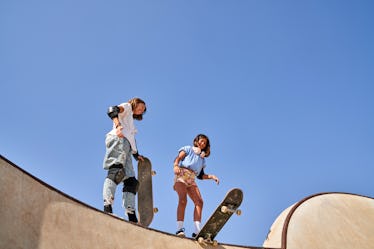 Two kids skateboarding.