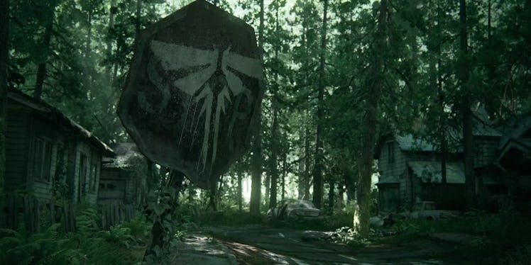The Firefly logo spray painted on a street sign in the first trailer for The Last of Us Part II