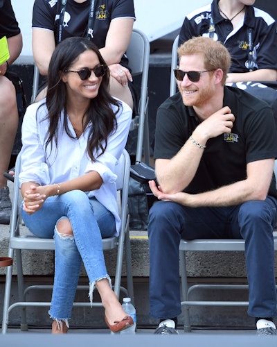 Meghan Markle and Prince Harry attend the Wheelchair Tennis on day 3 of the Invictus Games Toronto 2...