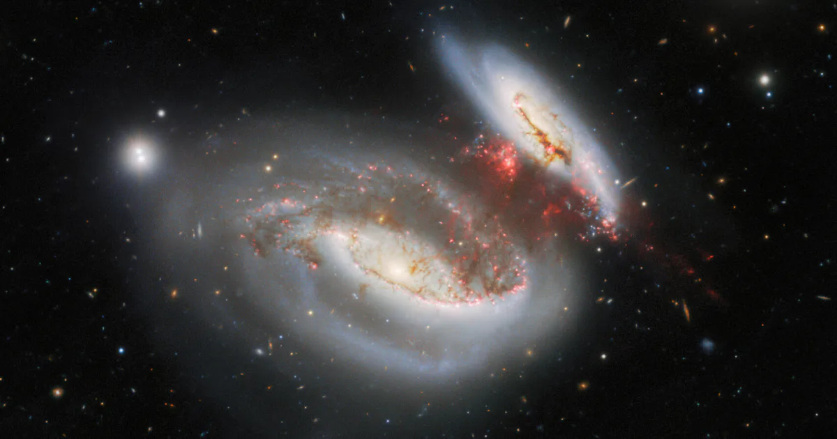 Intergalactic Fits Look! Astronomers Capture Stunning Image of an Intergalactic Hit and Run
