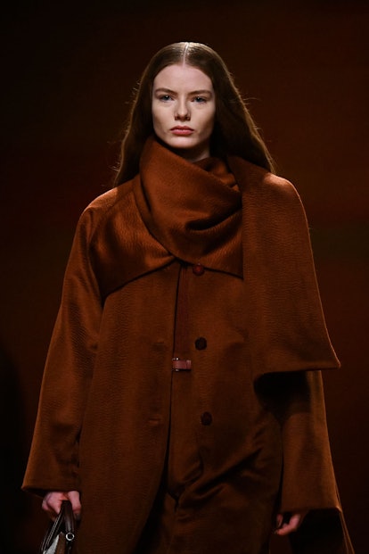 A model presents a creation from Hermes Womenswear Fall-Winter 2023-2024 collection during Paris Fas...