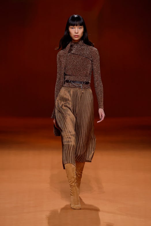 A model walks the runway during the Hermes Womenswear Fall Winter 2023-2024 show as part of Paris Fa...