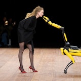A performance by a model with a robot at the Coperni Womenswear Fall Winter 2023-2024 show during Pa...