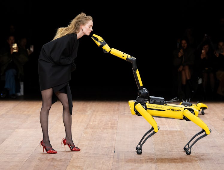 A performance by a model with a robot at the Coperni Womenswear Fall Winter 2023-2024 show during Pa...