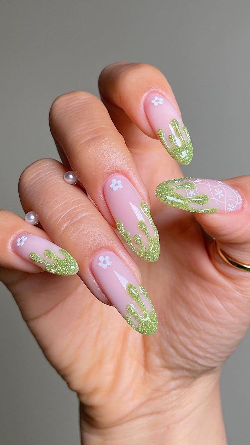 For simple St. Patrick's Day nails in 2023, try a light green French tip design.