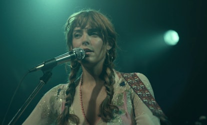 Riley Keough's guitar strap in 'Daisy Jones & The Six' is an Elvis Presley Easter egg.