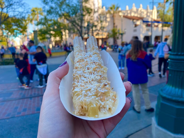 The Disney Food & Wine Festival 2023 food includes a pineapple churro that tastes like Dole Whip.