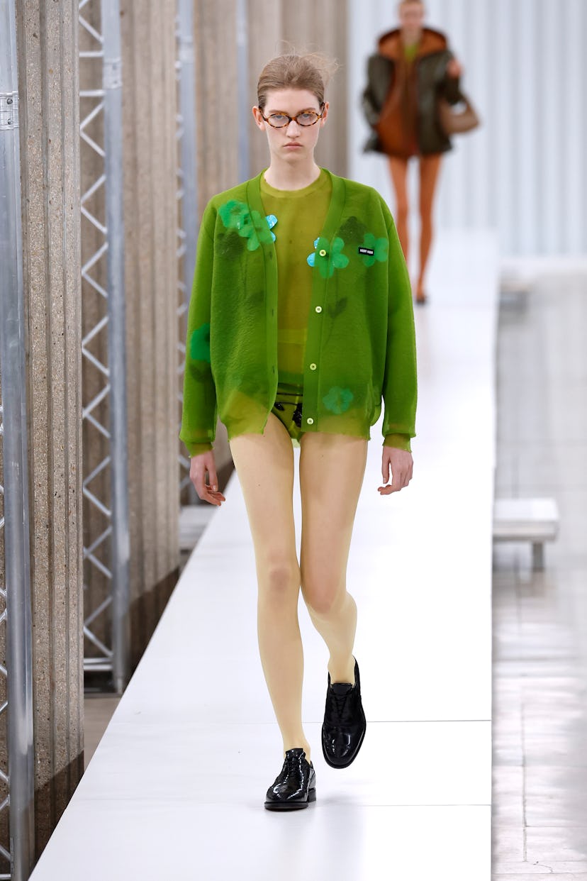 A model walks the runway during the Miu Miu Womenswear Fall Winter 2023-2024 show as part of Paris F...