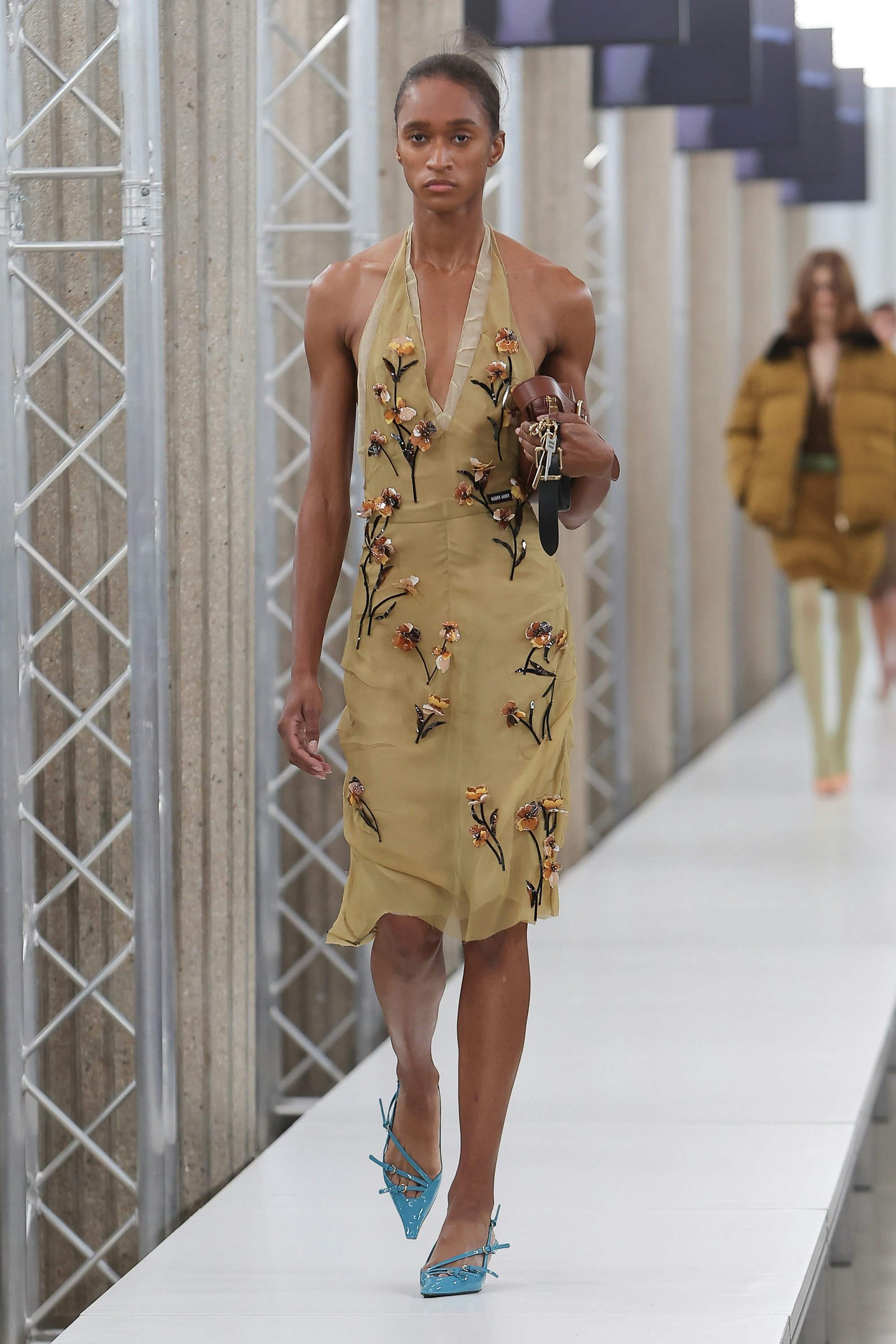 Miu Miu's Fall/Winter 2023 Runway Honed In On Skin-Baring Looks