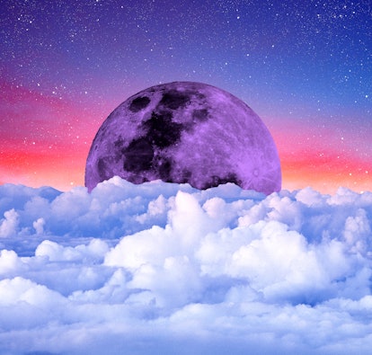 A full moon hidden behind clouds, representing TikTok's moon phase test, soulmates trend.