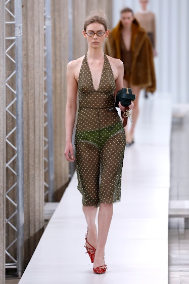 A model walks the runway during the Miu Miu Womenswear Fall Winter 2023-2024 show as part of Paris F...