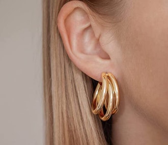 These earrings that look like multiple piercings feature three close-set hoops.