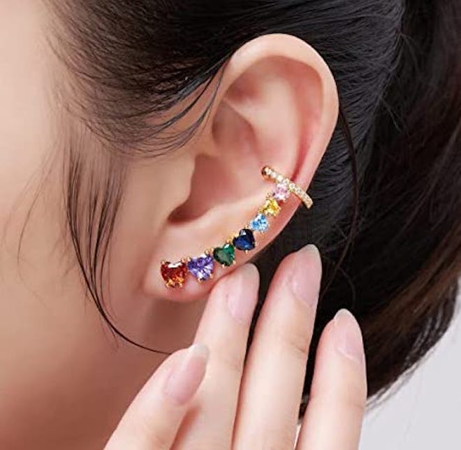 These crawler earrings that look like multiple piercings feature CZ stones in an array of jewel tone...