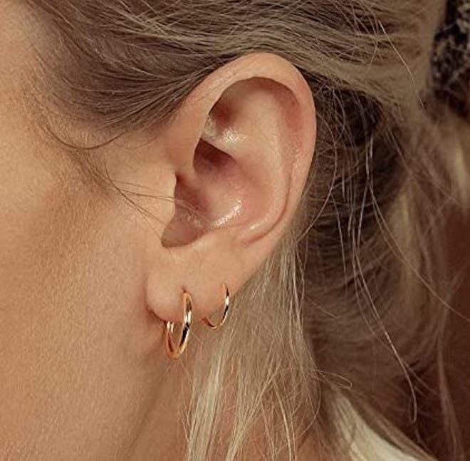 These earrings that look like multiple piercings feature two small hoops.