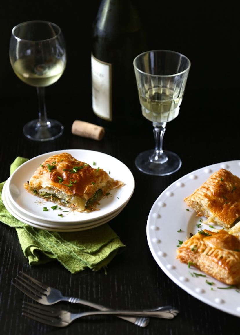 vegetable dumplings on a plate with wine glasses spring recipe
