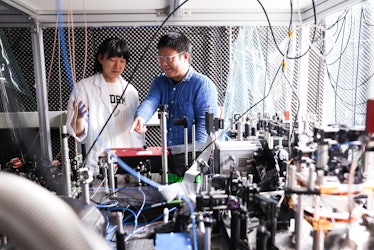 Research team members Hansub Hwang (left) and Andrew Byun (right) are pictured with the optical setu...