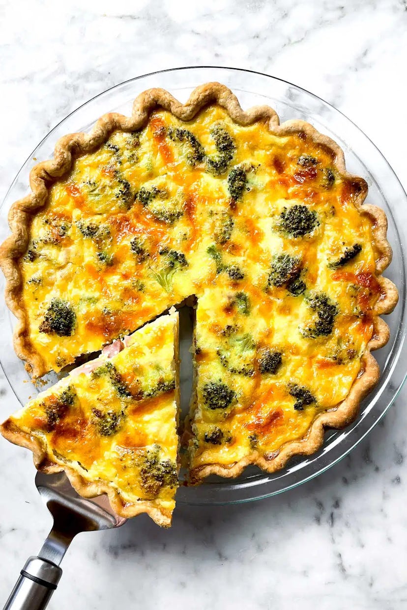 ham and cheese quiche on a table spring recipe