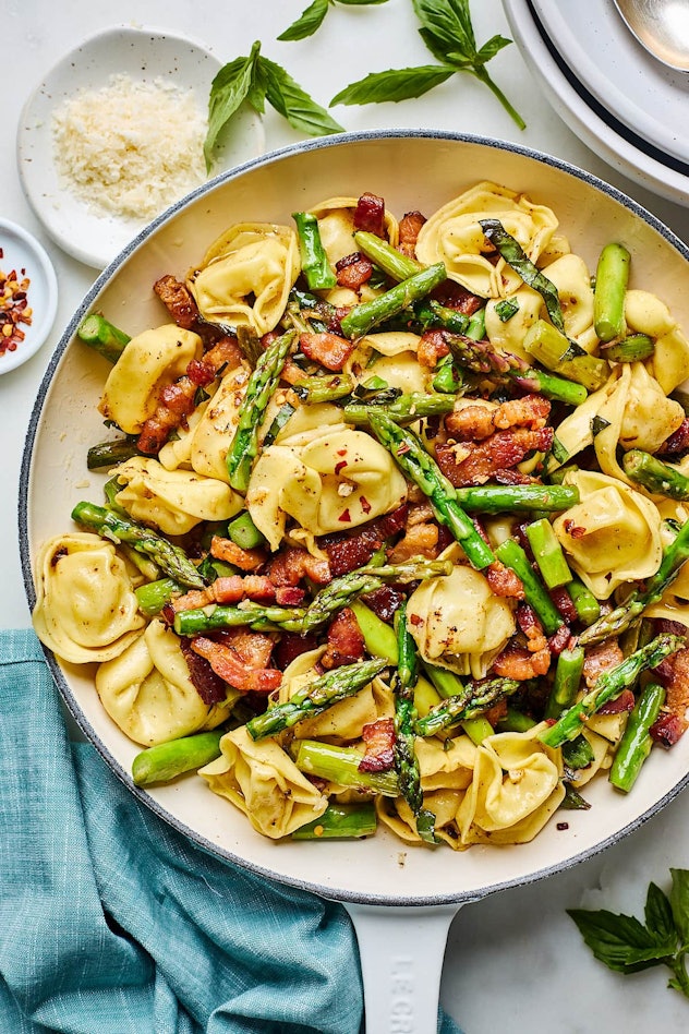 bowl of pasta with asparagus and bacon spring recipe