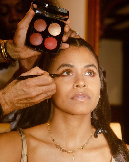 Zazie Beetz GQ awards eyeshadow makeup being applied behind the scenes