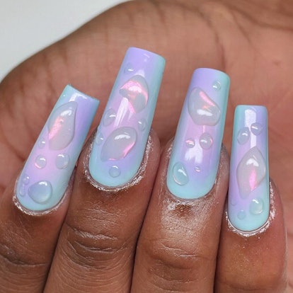 3D water drop nails are the perfect manicure for a beach vacation.