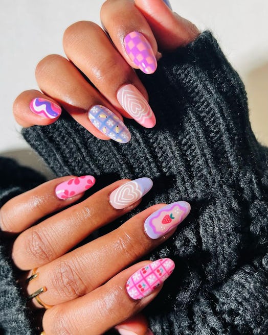 If you're going on a summer 2023 vacation, try pastel nail art.
