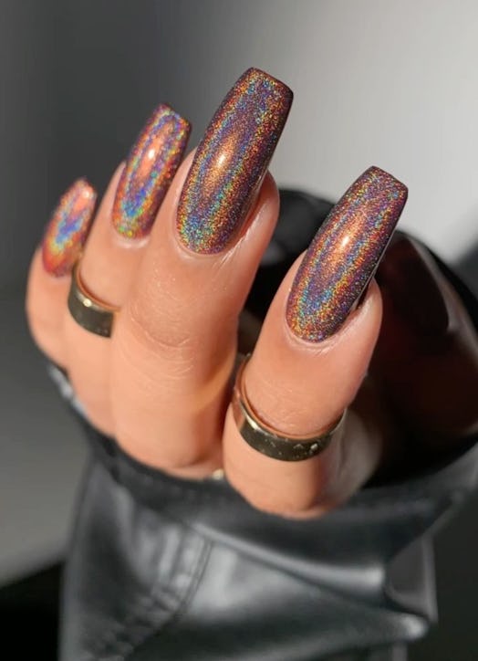 If you're going on a summer vacation, try holographic nails.