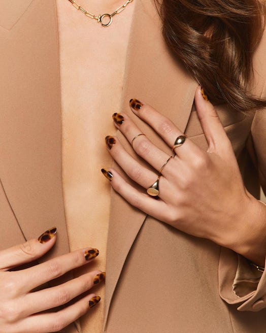 If you're going on a vacation in 2023, try tortoiseshell nails.