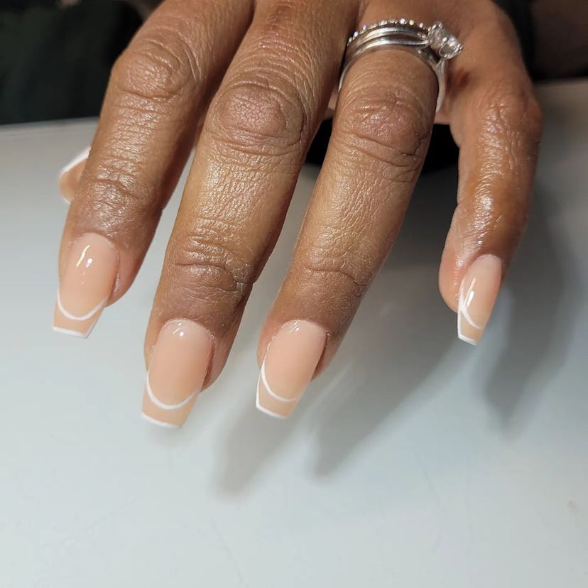 If you're going on a vacation, an invisible French manicure is the perfect nail art idea.