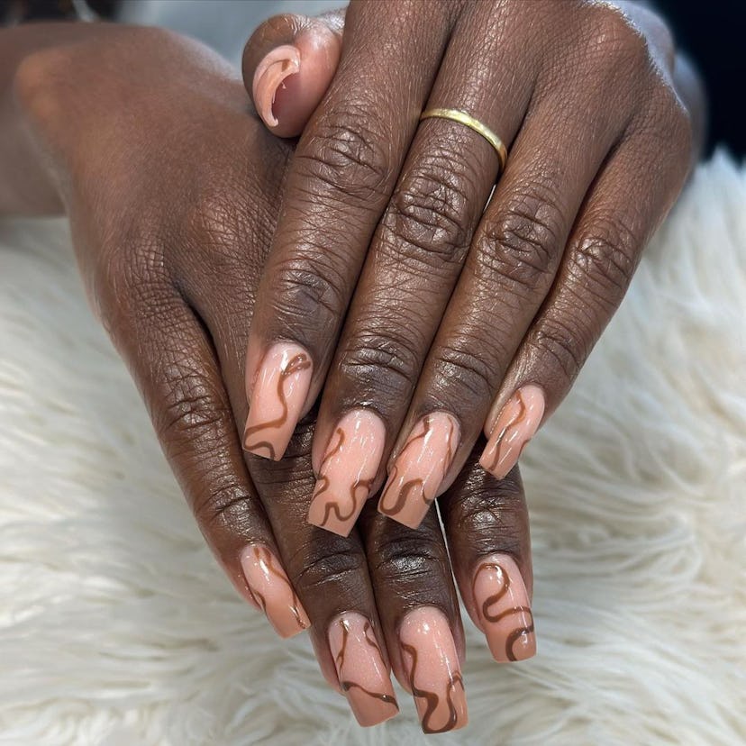 Minimal fine line nails are a great abstract manicure idea for vacation nails.
