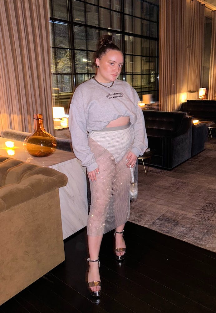 Tess Garcia wears a see through skirt and thong