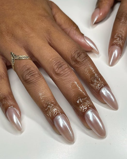 Glazed donut nails are a cute manicure idea for a 2023 vacation.