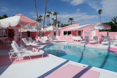 The Trixie Motel has an iconic pool that's pink and white.