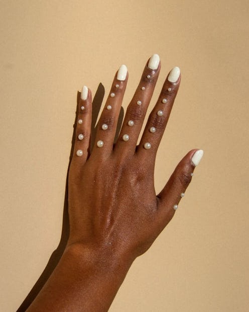 Here are the best milky white nail polish colors from OPI, Essie, and more to consider for milk bath...