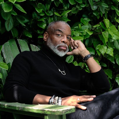 Levar Burton sitting in an Adirondak chair looking at the camera. 