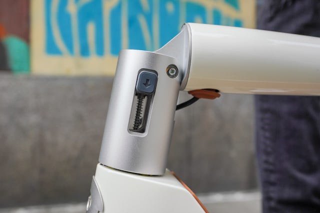 riding Unagi Model One Voyager electric scooter 