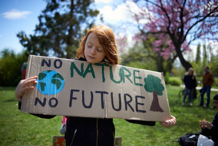 https://www.gettyimages.com/detail/news-photo/girl-holds-a-placard-reading-no-nature-no-future-the-d...
