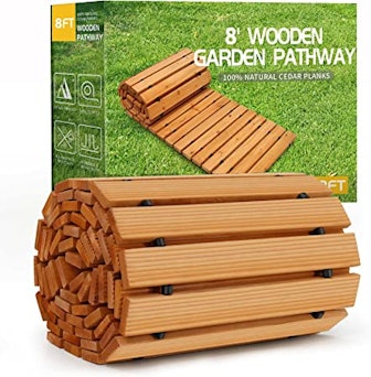 Main the health of your soil by reducing impact with this wooden garden pathway that creates a decor...