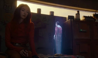 Sabine stares at a hologram of live-action Ezra Bridger in the Ahsoka trailer.