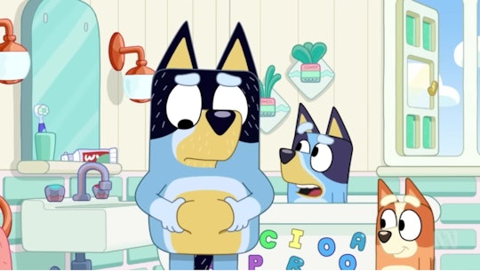 Bandit squeezing his belly as Bluey and Bingo look on in 'Bluey' "Exercise" episode.