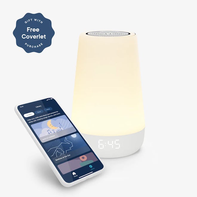 Lit Hatch Alarm clock and night light with smartphone next to it