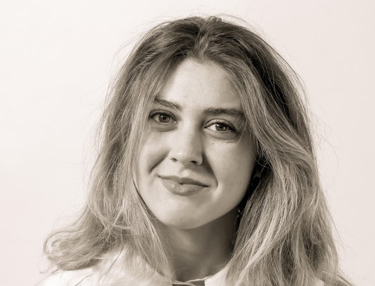 A black and white portrait of author Madeline Cash