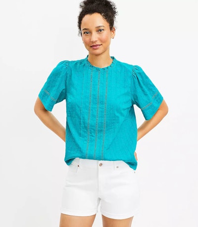 For Mother's Day outfit ideas, consider a bright blue blouse you can rewear all year long.