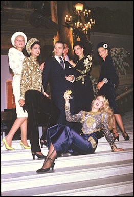 Karl Lagerfeld and his models (Jerry Hall lying down) at 1985-1986 Fall/Winter Chanel collection in ...