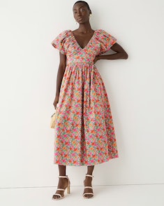Need Mother's Day outfit ideas? Consider this vibrant floral sun dress from J. Crew.