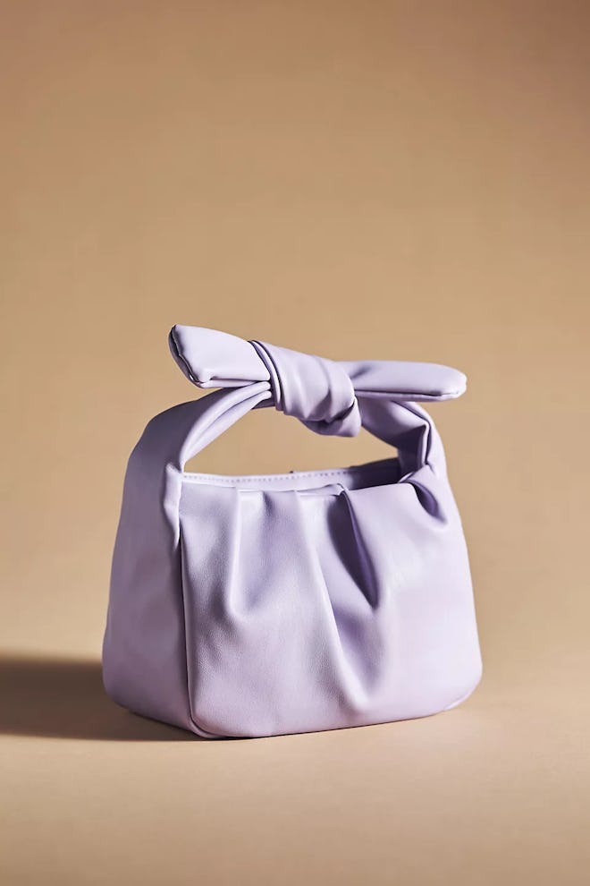 Need Mother's Day outfit ideas? Consider this lavender mini knot satchel.