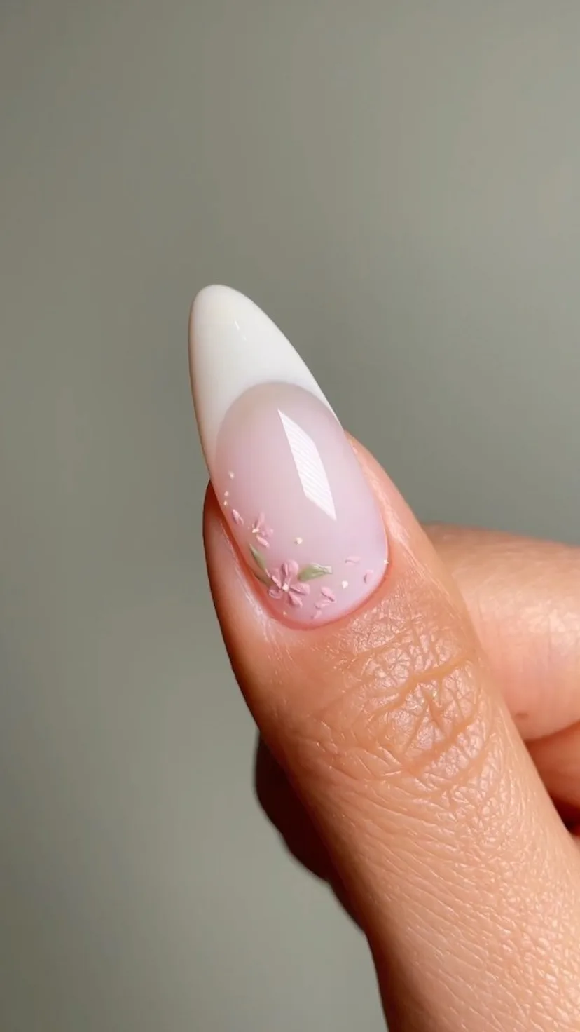 Try a vanilla French manicure with floral nail art for Taurus season 2023.
