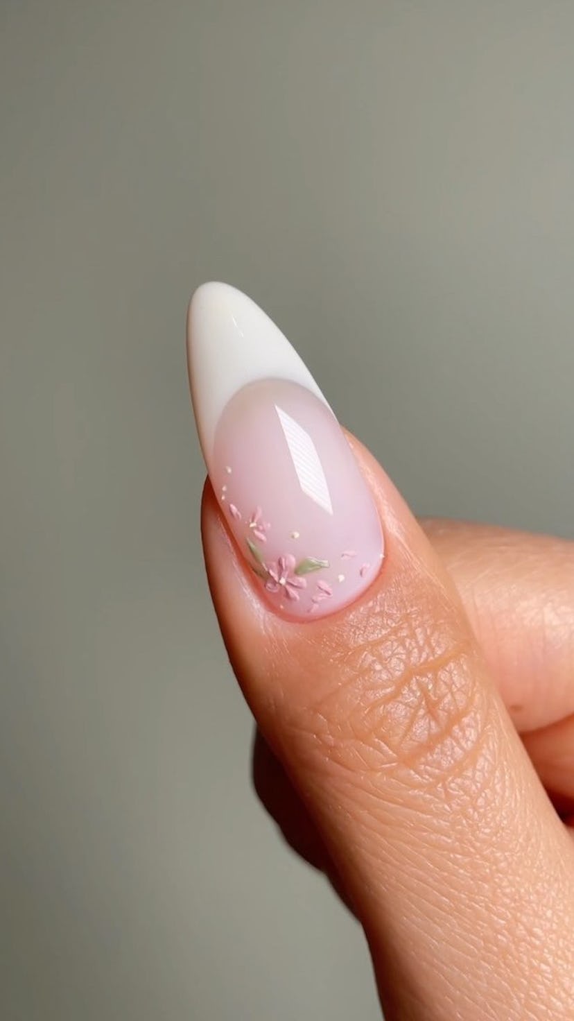 Try a vanilla French manicure with floral nail art for Taurus season 2023.