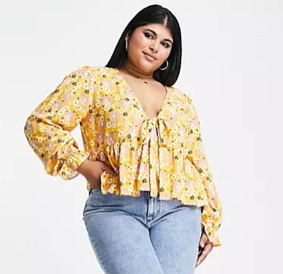 Mother's Day outfit ideas for flower lovers: this yellow blouse with long sleeves and a tie front